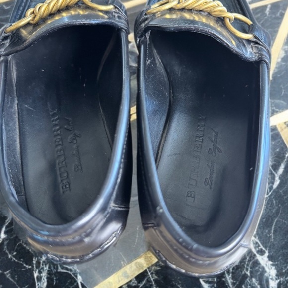 Burberry Black and Gold Slip-On Loafers with Chain Detail